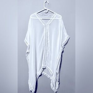 Shear white bathing suit cover